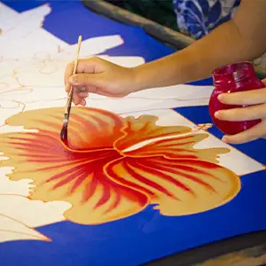 Hand-painted Polynesian pareo displayed during the Faanui Valley cultural tour