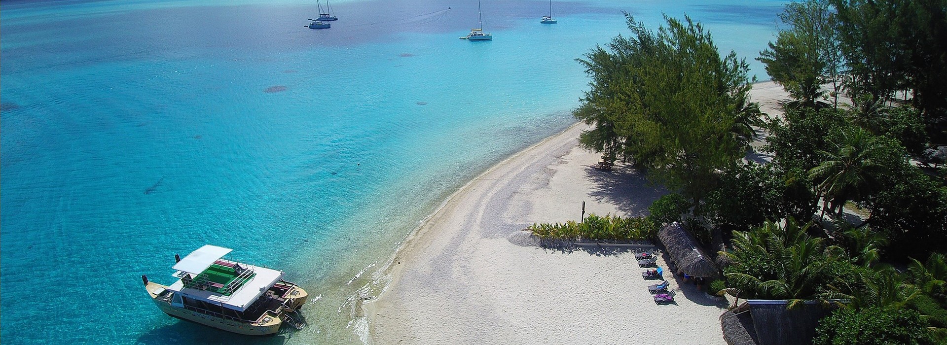 Jet Ski tour across the turquoise Bora Bora lagoon with motu scenery